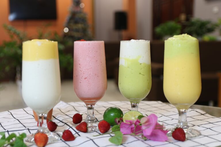 Healthy smoothie made with natural sweeteners like date syrup and jaggery in a glass jar
