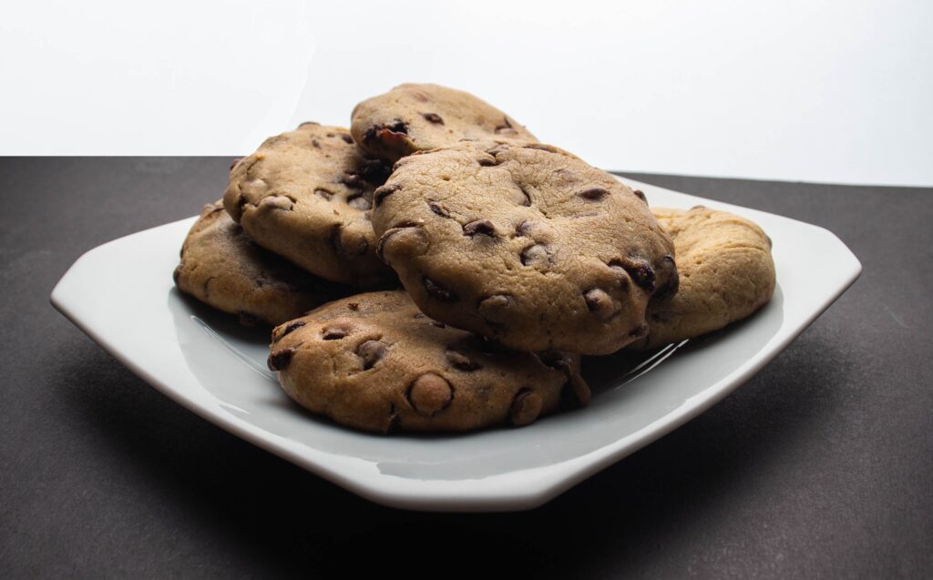 Jaggery chocolate chip cookies cooling on a wire rack