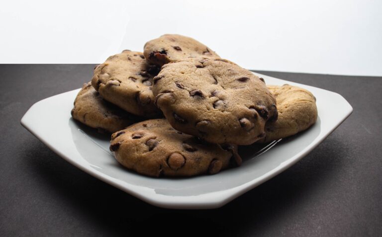 Jaggery chocolate chip cookies cooling on a wire rack