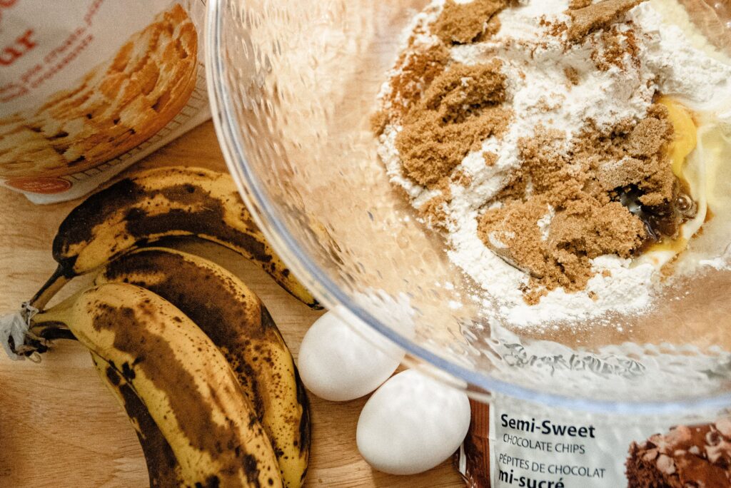 Sugar free banana bread made with coconut sugar, ripe bananas, and eggs on a kitchen counter